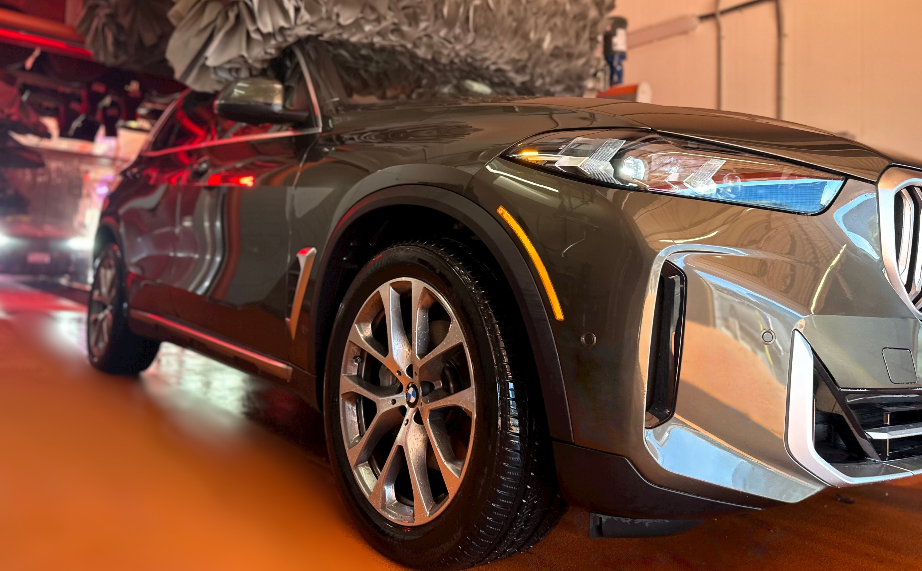 Clean car going through Mr Wash Car Wash express tunnel in Tysons Corner Virignia