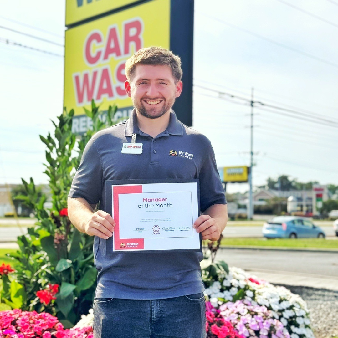 Mr Wash employee smiling at work