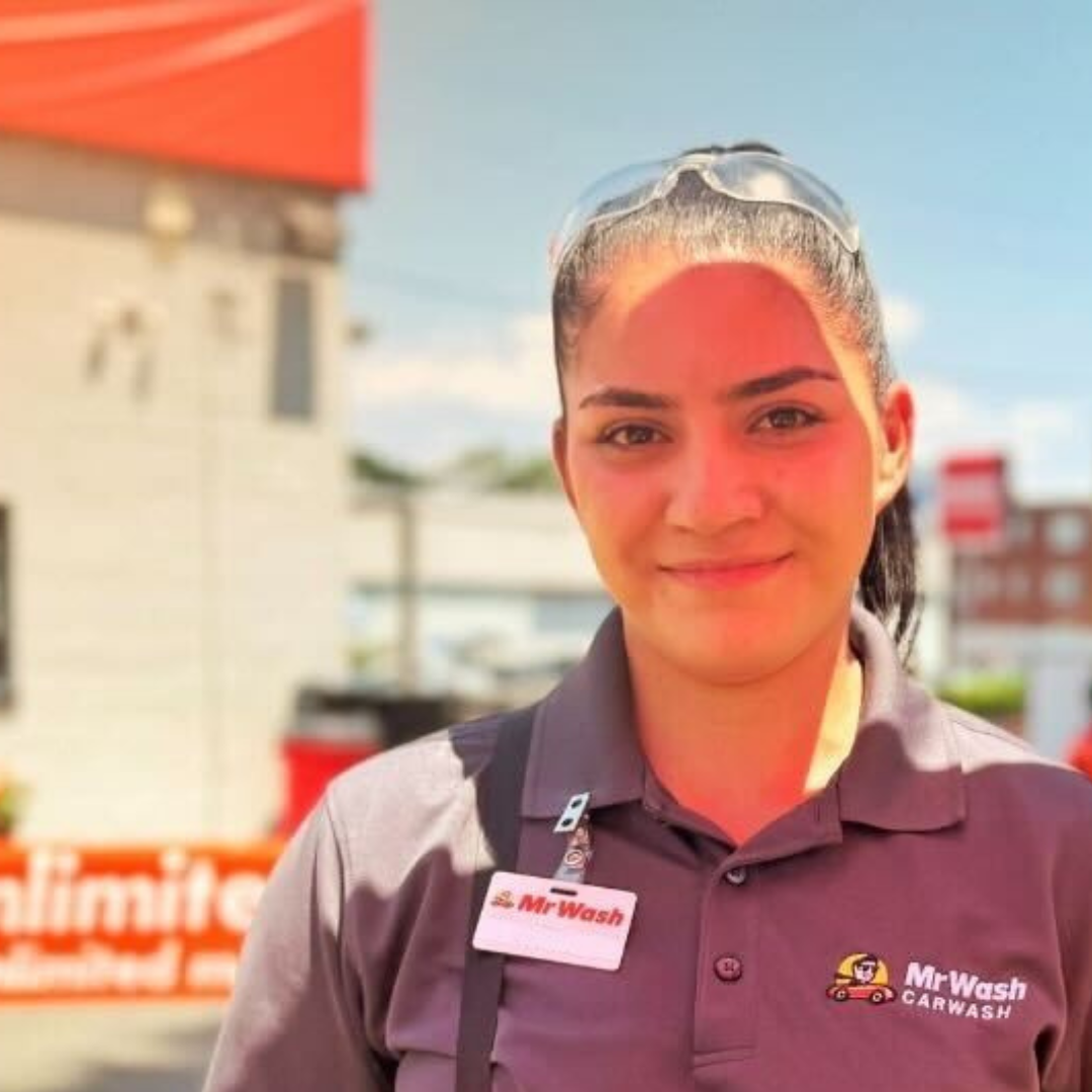 Mr Wash employee smiling at work